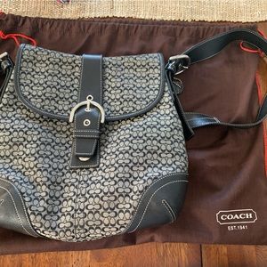 Coach Signature logo Black. Excellent condition . Comes with dust cover.